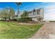 Waterfront home with palm trees and brick driveway at 25 Tidy Island Blvd # 25, Bradenton, FL 34210