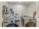 Laundry closet with LG washer and dryer, and water heater at 25 Tidy Island Blvd # 25, Bradenton, FL 34210