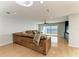 Living room with leather sectional and hardwood floors at 25 Tidy Island Blvd, Bradenton, FL 34210