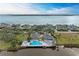 Community pool with expansive deck and waterfront views at 25 Tidy Island Blvd, Bradenton, FL 34210