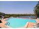 Inviting community pool overlooking a tranquil waterway at 25 Tidy Island Blvd # 25, Bradenton, FL 34210