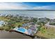 Community pool with expansive deck and waterfront views at 25 Tidy Island Blvd # 25, Bradenton, FL 34210