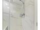 Walk-in shower with marble tile and modern fixtures at 25 Tidy Island Blvd # 25, Bradenton, FL 34210