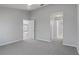 Bright bedroom with access to bathroom and another room at 2608 Edgewater Ct, Palmetto, FL 34221