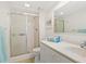 Clean bathroom with shower/tub combo and updated vanity at 3240 Gulf Of Mexico Dr # B104, Longboat Key, FL 34228