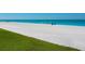 Expansive beach with white sand and clear water at 3240 Gulf Of Mexico Dr # B104, Longboat Key, FL 34228