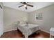 Bedroom with queen bed, nightstands and hardwood floors at 330 Caruso Pl, Sarasota, FL 34237