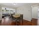 Bright dining area with wood table and chairs near the kitchen at 330 Caruso Pl, Sarasota, FL 34237