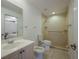 Clean bathroom with walk-in shower and toilet at 3395 Hardee Dr, Venice, FL 34292