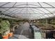 Spacious greenhouse with rows of plants and succulents at 3395 Hardee Dr, Venice, FL 34292