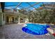 Enclosed pool with patio and house view at 3395 Hardee Dr, Venice, FL 34292