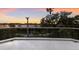 Balcony overlooking the water with sunset views at 3491 Bayou Sound, Longboat Key, FL 34228