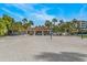 Beachfront volleyball court with pavilion at 3491 Bayou Sound, Longboat Key, FL 34228