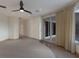 Spacious bedroom with water views and sliding glass doors at 3491 Bayou Sound, Longboat Key, FL 34228