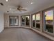 Bedroom with water views and ceiling fan at 3491 Bayou Sound, Longboat Key, FL 34228