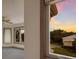 Bedroom with sunset view and ceiling fan at 3491 Bayou Sound, Longboat Key, FL 34228