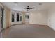 Spacious bedroom with bay window, carpet, and ceiling fan at 3491 Bayou Sound, Longboat Key, FL 34228