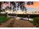 Private dock with steps leading to the water at 3491 Bayou Sound, Longboat Key, FL 34228