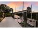 Steps leading to a private boat dock and lift at 3491 Bayou Sound, Longboat Key, FL 34228