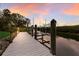 Convenient boat lift at a private dock at 3491 Bayou Sound, Longboat Key, FL 34228