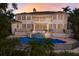 Luxury home with pool and beautiful sunset views at 3491 Bayou Sound, Longboat Key, FL 34228