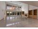 Spacious living room featuring a fireplace, built-in shelves, and large windows at 3491 Bayou Sound, Longboat Key, FL 34228