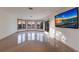 Bright living room with water views and large windows at 3491 Bayou Sound, Longboat Key, FL 34228