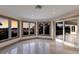 Living room with expansive windows and water views at 3491 Bayou Sound, Longboat Key, FL 34228