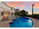 Luxury home with large pool and beautiful sunset views at 3491 Bayou Sound, Longboat Key, FL 34228