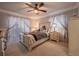 Main bedroom with a comfortable bed and neutral color scheme at 3951 Lake Bayshore Dr # F408, Bradenton, FL 34205