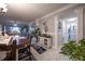 Dining area with view into living room and hallway to bathroom at 3951 Lake Bayshore Dr # F408, Bradenton, FL 34205