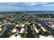 Aerial view highlighting property's waterfront access and community amenities at 4108 La Costa Cv, Bradenton, FL 34210