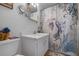 Bathroom with a mermaid-themed shower curtain at 4108 La Costa Cv, Bradenton, FL 34210