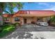 Condo exterior featuring carport and landscaping at 4108 La Costa Cv, Bradenton, FL 34210