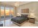 Bedroom with king-size bed and ocean views at 415 L Ambiance Dr # A401, Longboat Key, FL 34228