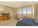 Spacious bedroom with ocean views and a large bed at 415 L Ambiance Dr # A401, Longboat Key, FL 34228