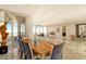 Elegant dining area with wood table and ocean views at 415 L Ambiance Dr # A401, Longboat Key, FL 34228