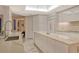 Modern kitchen with marble countertops and island at 415 L Ambiance Dr # A401, Longboat Key, FL 34228