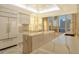 Modern kitchen with marble countertops and island at 415 L Ambiance Dr # A401, Longboat Key, FL 34228