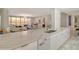 Modern kitchen with marble countertops and stainless steel appliances at 415 L Ambiance Dr # A401, Longboat Key, FL 34228