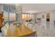 Open living space with sunset views and marble floors at 415 L Ambiance Dr # A401, Longboat Key, FL 34228