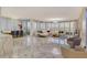 Spacious living area with ocean views and marble floors at 415 L Ambiance Dr # A401, Longboat Key, FL 34228