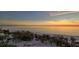 Scenic ocean and beach view at sunset from above at 415 L Ambiance Dr # A401, Longboat Key, FL 34228