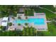 Large resort-style pool with surrounding lounge chairs at 415 L Ambiance Dr # A401, Longboat Key, FL 34228