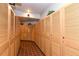 Hallway with multiple individual storage lockers at 415 L Ambiance Dr # A401, Longboat Key, FL 34228