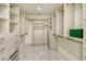 Large walk-in closet with ample shelving and drawer space at 415 L Ambiance Dr # A401, Longboat Key, FL 34228