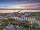 Aerial view of waterfront townhomes at sunset at 4238 Marina View Way, Cortez, FL 34215