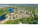 Large community with lake, pool, and tennis courts at 4250 Players Pl # 2615, Sarasota, FL 34238