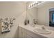 Clean bathroom with single sink vanity and a shower at 4250 Players Pl # 2615, Sarasota, FL 34238