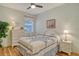 Cozy bedroom with a full-size bed and plenty of storage at 4250 Players Pl # 2615, Sarasota, FL 34238